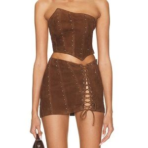 Alessandra Rich asymmetric top + lace up mini skirt